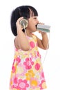 Asian Chinese little girl playing tin can phone Royalty Free Stock Photo