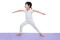 Asian Chinese little girl practicing yoga pose Royalty Free Stock Photo