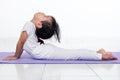 Asian Chinese little girl practicing yoga pose Royalty Free Stock Photo