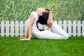 Asian Chinese little girl practicing yoga pose on a mat Royalty Free Stock Photo