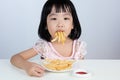 Asian Chinese little girl Refusing Eating French fries