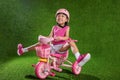 Asian Chinese little girl riding bicycle Royalty Free Stock Photo