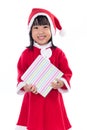 Asian Chinese little girl in santa costume holding gift box Royalty Free Stock Photo