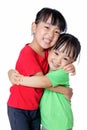 Asian Chinese little girls hugging each other