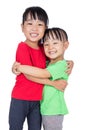 Asian Chinese little girls hugging each other Royalty Free Stock Photo