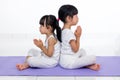 Asian Chinese little girls practicing yoga pose Royalty Free Stock Photo