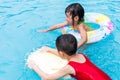 Asian Chinese Little Kids Playing in the Swimming Pool Royalty Free Stock Photo