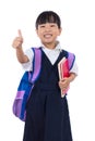 Asian Chinese little primary school girl showing thumbs up Royalty Free Stock Photo