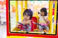 Asian Chinese Little Sister Driving Toy Bus Royalty Free Stock Photo