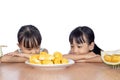 Asian Chinese little sisters waiting to eat durian fruit Royalty Free Stock Photo
