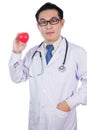 Asian Chinese male doctor holding red heart with stethoscope Royalty Free Stock Photo