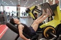 Asian chinese man in gym Ã¯Â¼ÅFitness sport man Training of leg strength in the gym Royalty Free Stock Photo