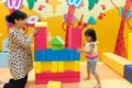 Asian Chinese Mom and Daugther Playing Giant Blocks
