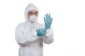 Asian Chinese scientist in protective wear putting on gloves