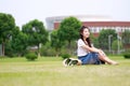 Asian Chinese university student play on the playground Royalty Free Stock Photo