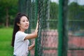 Asian Chinese university student play on the playground Royalty Free Stock Photo