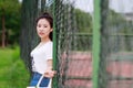 Asian Chinese university student play on the playground