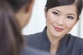 Asian Chinese Woman or Businesswoman in Meeting