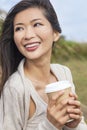 Asian Chinese Woman Girl Drinking Coffee Outside Royalty Free Stock Photo