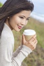 Asian Chinese Woman Girl Drinking Coffee Outside Royalty Free Stock Photo