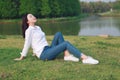 Aisan Chinese woman beautiful girl enjoy free causual time by a lake