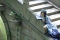 Asian Chinese woman in traditional Blue and white Hanfu dress, play in a famous garden