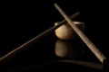 Asian chopsticks isolated on black glass Royalty Free Stock Photo