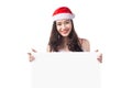 Asian Christmas girl with Santa Claus clothes holding blank sign Royalty Free Stock Photo