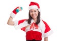 Asian Christmas girl with Santa Claus clothes and red dumbbell. Royalty Free Stock Photo