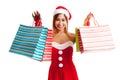 Asian Christmas girl with Santa clothes and shopping bag Royalty Free Stock Photo