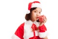 Asian Christmas Santa Claus girl kiss a gift box Royalty Free Stock Photo
