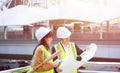 Asian civil engineer, Building Architect, inspector, contractor, wearing safety helmet. Royalty Free Stock Photo