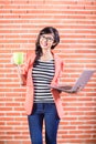 Asian college student with Laptop and coffee Royalty Free Stock Photo