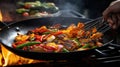 Asian Cook grilling vegetables in a wok - food photography