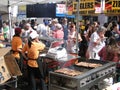 Asian cooks serving food