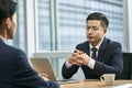 asian corporate executives discussing business in office Royalty Free Stock Photo