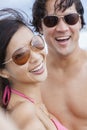 Asian Couple at Beach Taking Selfie Photograph Royalty Free Stock Photo