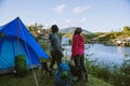 Asian couple Camp on the mountain in the upper village near the lake, Camping Travel Concept,Travel Relax concept Map