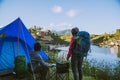 Asian couple Camp on the mountain in the upper village near the lake, Camping Travel Concept,Travel Relax concept Map