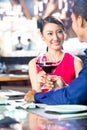 Asian couple fine dining in restaurant Royalty Free Stock Photo