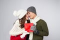 Asian couple giving each other christmas gifts Royalty Free Stock Photo
