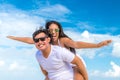 Asian couple having fun on the beach of tropical Bali island, Indonesia. Royalty Free Stock Photo