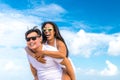 Asian couple having fun on the beach of tropical Bali island, Indonesia. Royalty Free Stock Photo