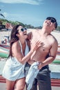 Asian couple having fun on the beach of tropical Bali island, Indonesia. Royalty Free Stock Photo