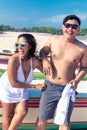 Asian couple having fun on the beach of tropical Bali island, Indonesia. Royalty Free Stock Photo
