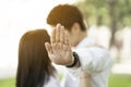 Asian couple kissing outdoor in the park Royalty Free Stock Photo