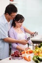 Asian couple looking at USG fetus picture