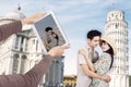 Asian couple at Pisa Tower Italy Royalty Free Stock Photo