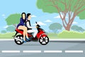 Asian Couple Ride Motorcycle Scooter