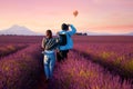 Asian couple travel in lavender field Royalty Free Stock Photo